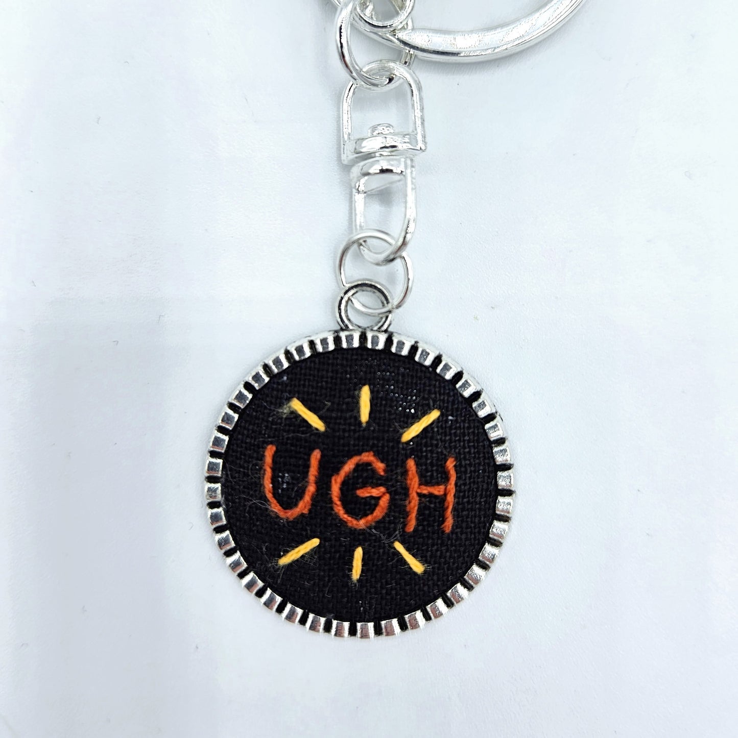 Orange Ugh Keychain (Black & Silver)